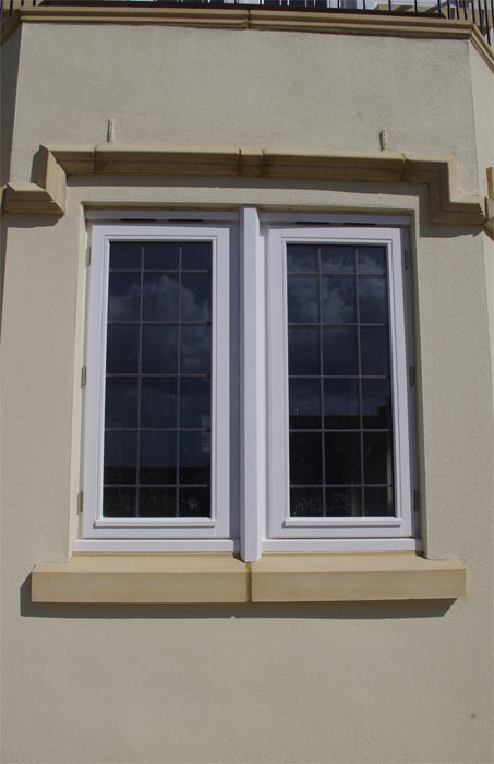 Window detailing matching that of nearby older properties